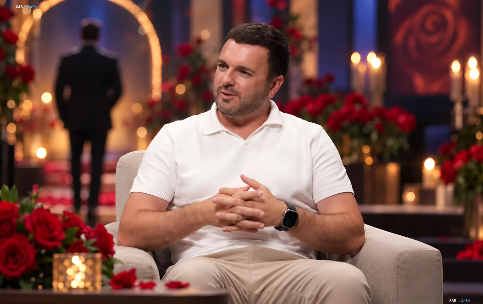 Hryhoriy Reshetnyk sitting in an armchair during the filming of The Bachelor TV show