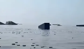 Sunken containers and parts of the GFS Pride vessel in the waters of the Strait of Hormuz