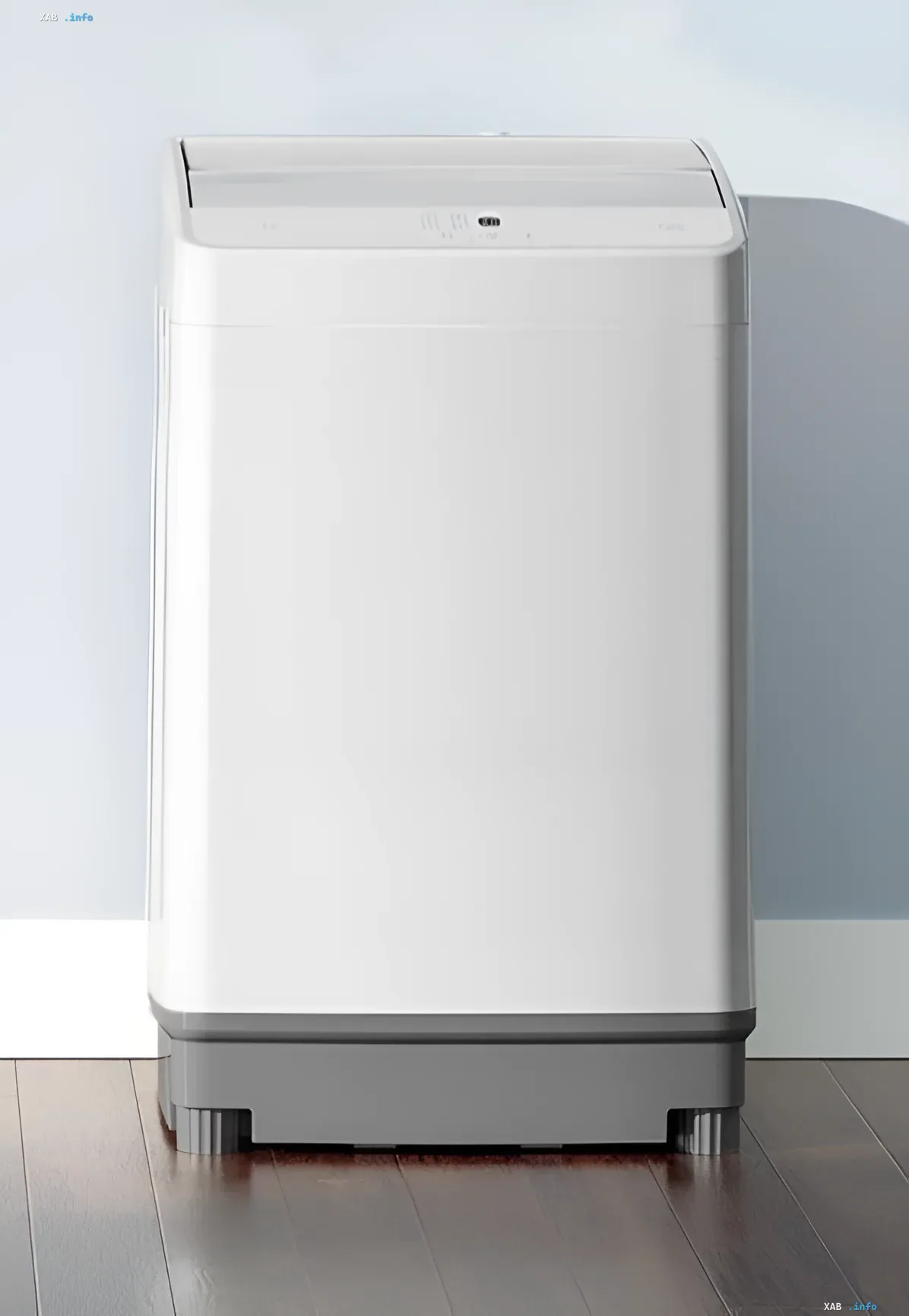 Біла компактна пральна машина Xiaomi Mijia Giant Washing Pulsator з сірою нижньою панеллю в інтер'єрі