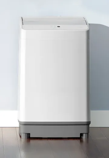 Біла компактна пральна машина Xiaomi Mijia Giant Washing Pulsator з сірою нижньою панеллю в інтер'єрі