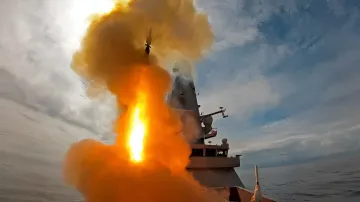 Launch of an anti-aircraft missile from a warship in the open sea during military exercises