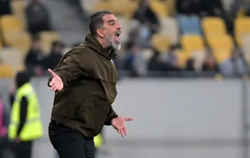 Shakhtar Donetsk head coach Arda Turan emotionally managing his team during a Champions League match
