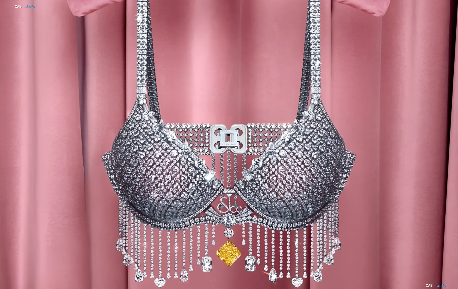 Роскошный Fantasy Bra от Jacob & Co с бриллиантами и желтым камнем на фоне розовой ткани