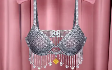 Роскошный Fantasy Bra от Jacob & Co с бриллиантами и желтым камнем на фоне розовой ткани