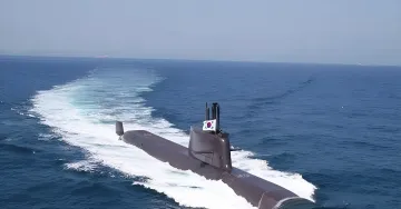 South Korean submarine moving across the blue ocean water surface