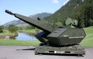 Automatic anti-aircraft gun Oerlikon Revolver Gun Mk3 by Rheinmetall displayed outdoors