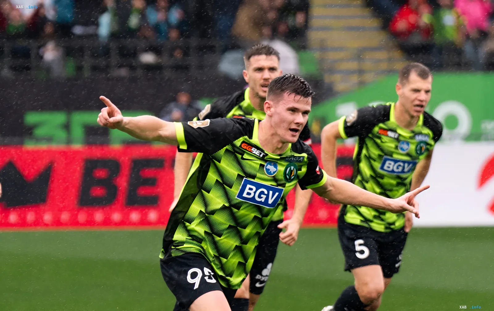 Footballer of Zhytomyr's Polissya celebrates a scored goal during a rainy Ukrainian Premier League match