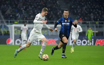 Shakhtar and Inter players compete for the ball during a Champions League match