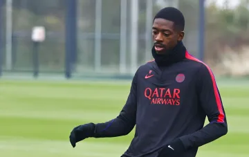 Ousmane Dembele in PSG training kit on a football pitch