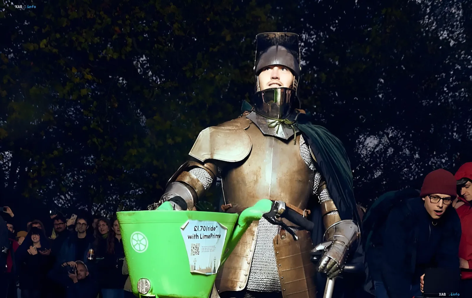 A man in medieval plate armor sits on a bright green Lime rental e-bike in a London park