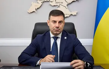 Уповноважений Верховної Ради з прав людини Дмитро Лубінець за робочим столом з українським прапором
