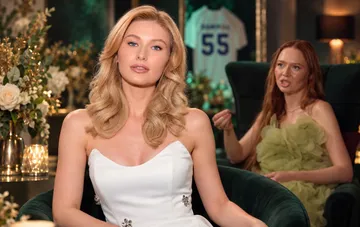 The Bachelor participant Viktoria Khilyuk in a white dress during reality show filming
