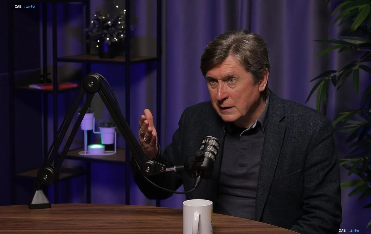 Political analyst Volodymyr Fesenko giving an interview in a studio during a podcast