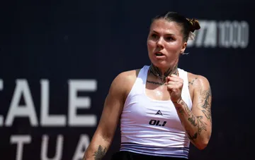 Украинская теннисистка во время матча на квалификационном турнире WTA 500 в Токио