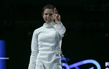Ukrainian fencer Vlada Kharkova celebrating her victory at the Ukrainian Cup