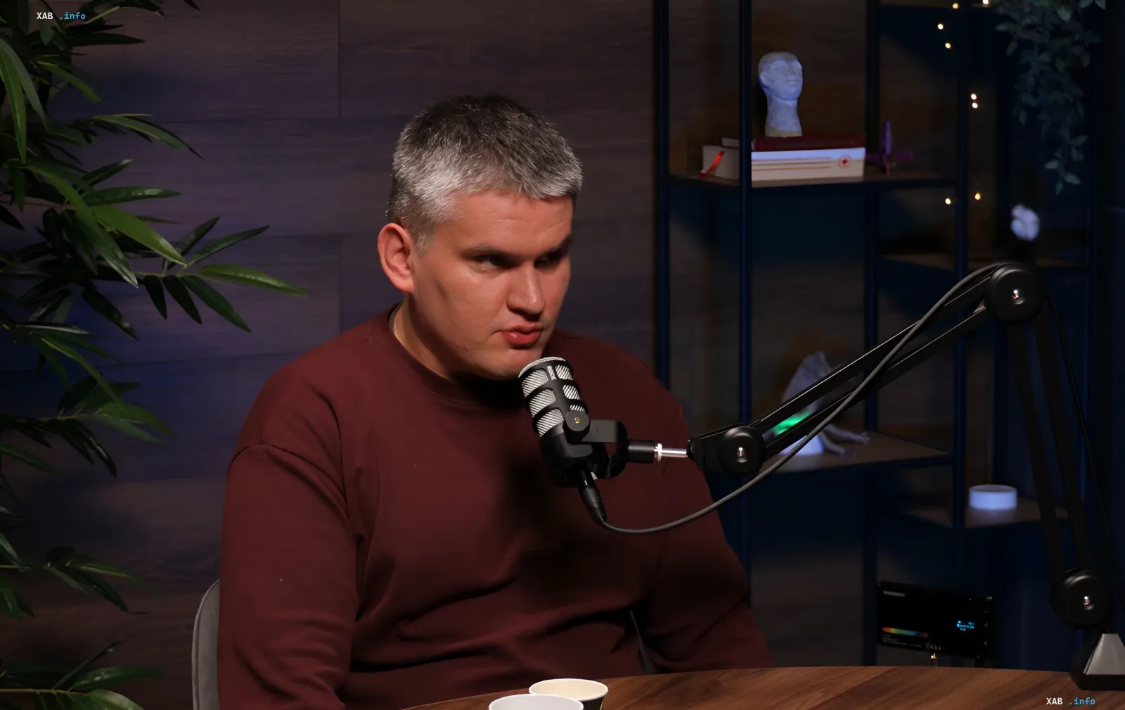 Military expert Ivan Kyrychevskyi gives an interview in the studio during a podcast