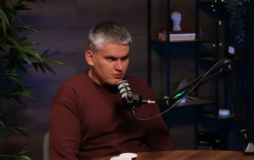 Military expert Ivan Kyrychevskyi gives an interview in the studio during a podcast