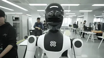 Humanoid robot with a black helmet and white body against the background of a Foxconn office and staff