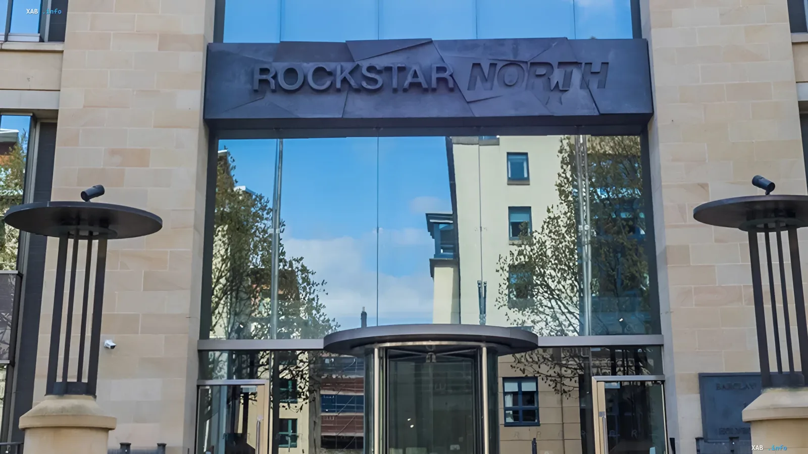 Modern office building of Rockstar North with a glass facade and signage in Edinburgh